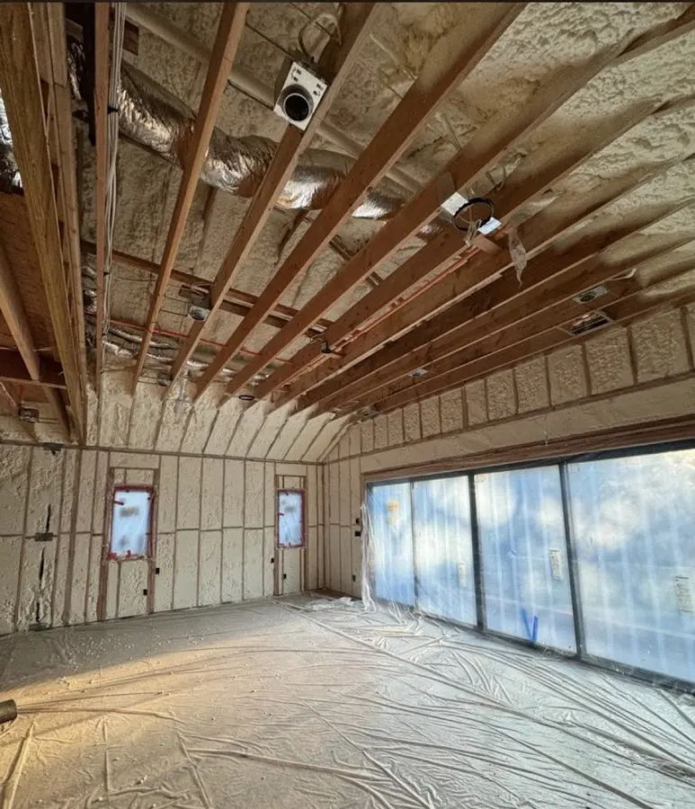 Interior walls and ceiling insulated with spray foam during new construction in North St. Paul